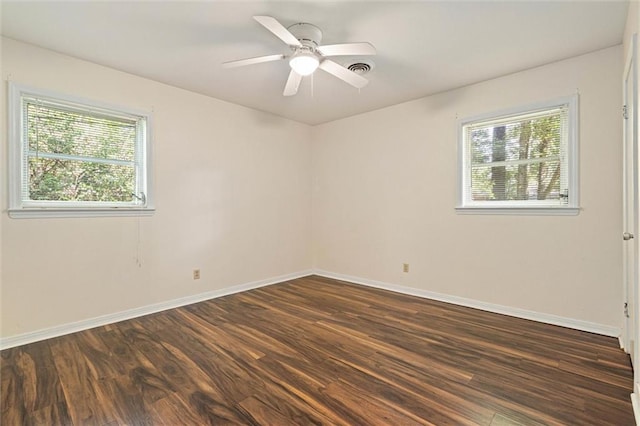 5416 Hilltop Dr N, Mobile, AL 36608 - unfurnished room with healthy amount of natural light, dark wood finished floors, and ceiling fan
