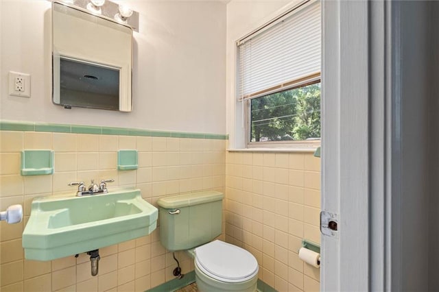 5416 Hilltop Dr N, Mobile, AL 36608 - bathroom with tile walls and a wainscoted wall
