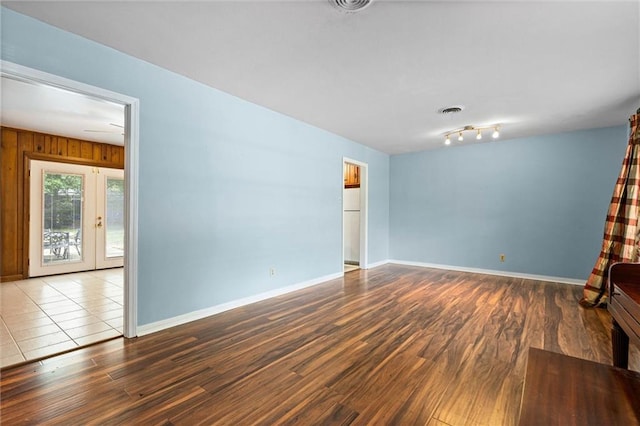 5416 Hilltop Dr N, Mobile, AL 36608 - spare room featuring wood finished floors and baseboards