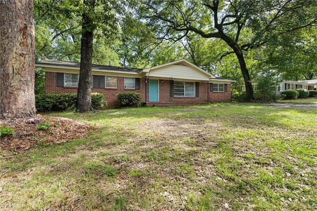 5416 Hilltop Dr N, Mobile, AL 36608 - ranch-style house with brick siding and a front yard