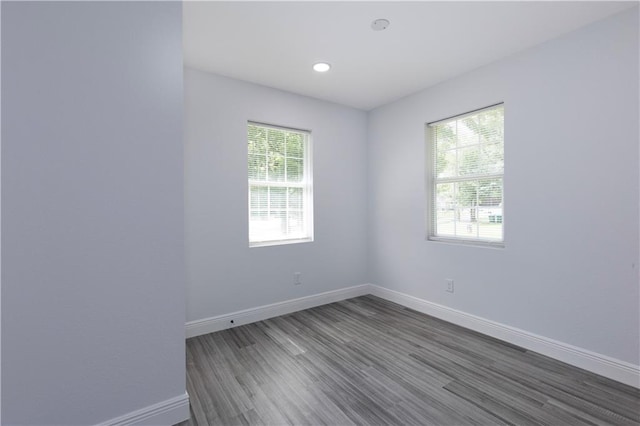5023 Santos Dr W, Mobile, AL 36619 - empty room featuring healthy amount of natural light, wood finished floors, and recessed lighting