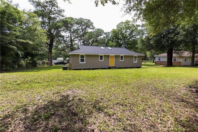 5023 Santos Dr W, Mobile, AL 36619 - back of property with entry steps, a yard, and view of scattered trees
