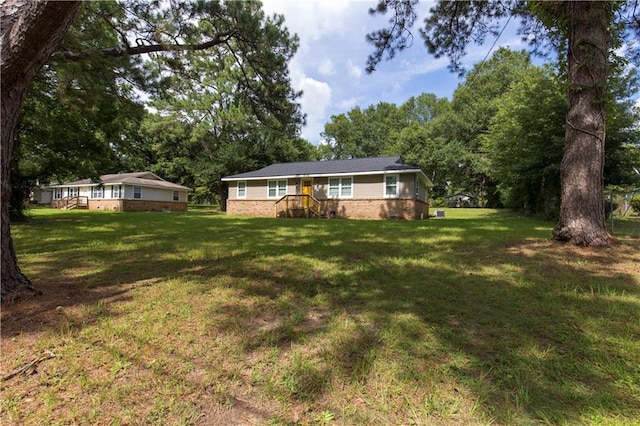 5023 Santos Dr W, Mobile, AL 36619 - view of green lawn with view of scattered trees