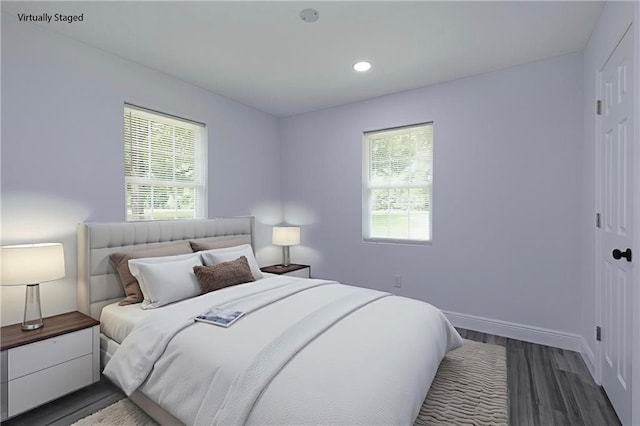 5023 Santos Dr W, Mobile, AL 36619 - bedroom featuring multiple windows, dark wood-type flooring, and recessed lighting