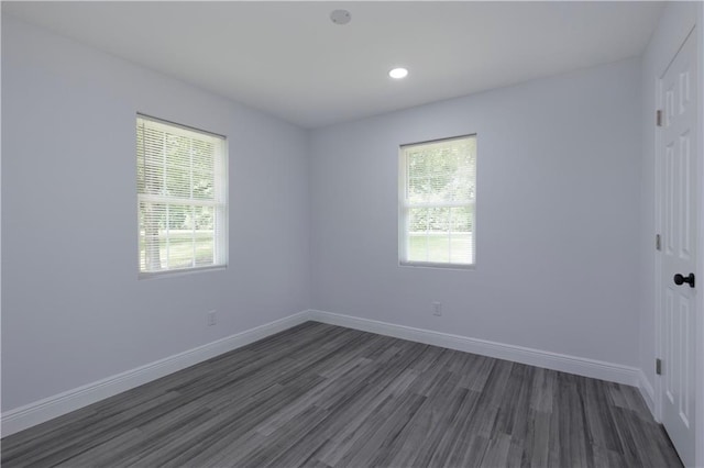 5023 Santos Dr W, Mobile, AL 36619 - unfurnished room with dark wood-style floors, plenty of natural light, and recessed lighting