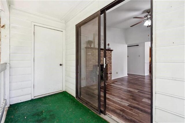 6050 Grelot Rd Unit 202, Mobile, AL 36609 - interior space featuring a ceiling fan, carpet, wood finished floors, and ornamental molding
