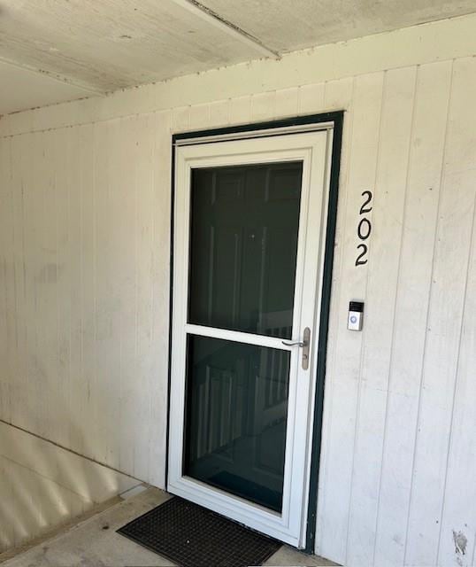 6050 Grelot Rd Unit 202, Mobile, AL 36609 - view of exterior entry
