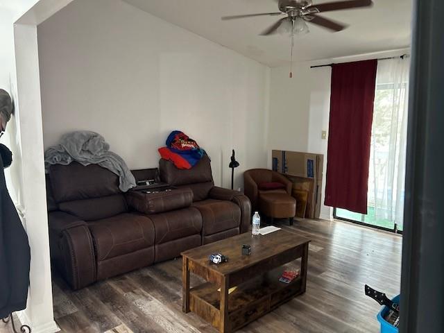 6050 Grelot Rd Unit 202, Mobile, AL 36609 - living area featuring ceiling fan, wood finished floors, and a healthy amount of sunlight