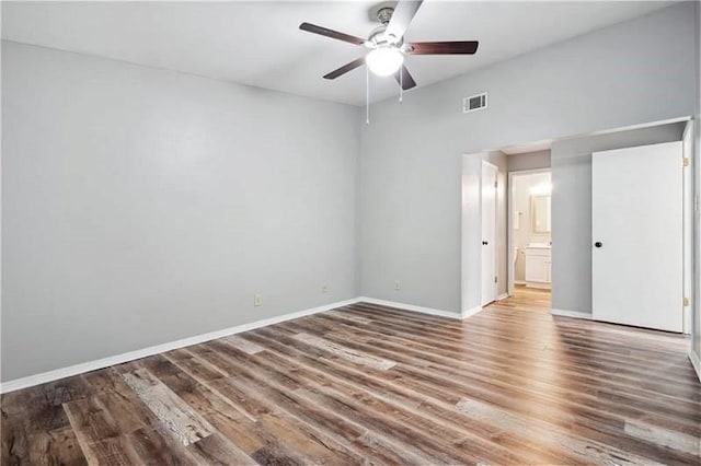 6050 Grelot Rd Unit 202, Mobile, AL 36609 - spare room with visible vents, a ceiling fan, baseboards, and wood finished floors