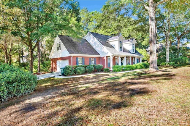 new england style home featuring a front lawn