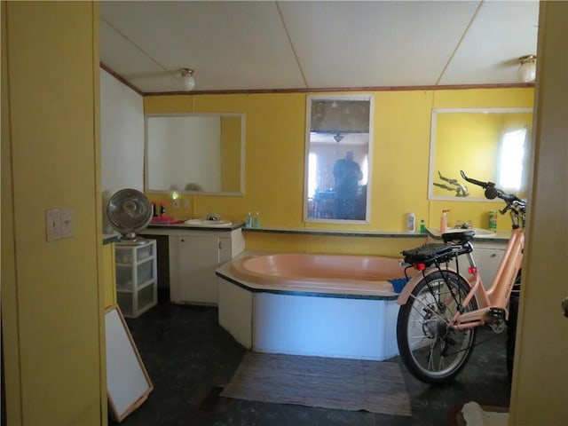 full bathroom with a sink and a bath