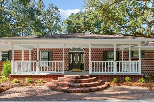 view of front of home featuring covered porch