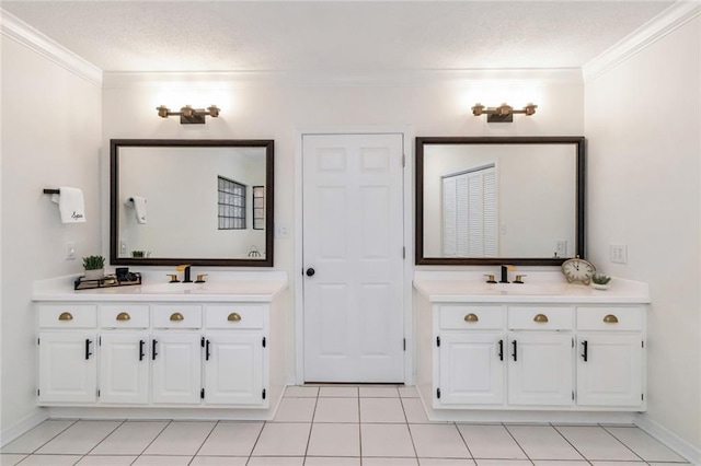 bathroom featuring tile patterned floors, vanity, and ornamental molding