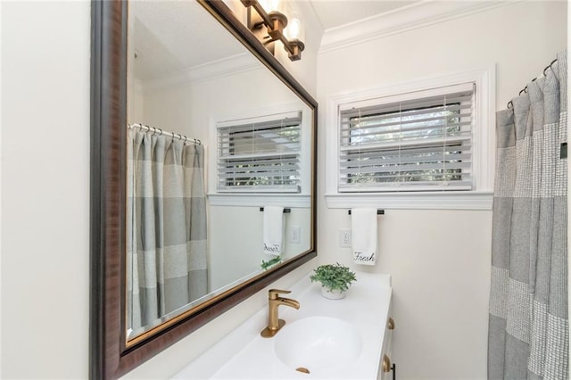 bathroom with vanity, a shower with shower curtain, and ornamental molding