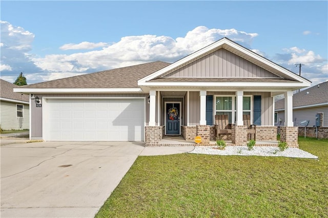 craftsman-style house with a garage, a front lawn, and a porch