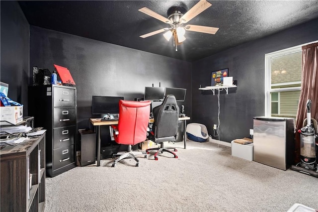 home office with carpet and ceiling fan