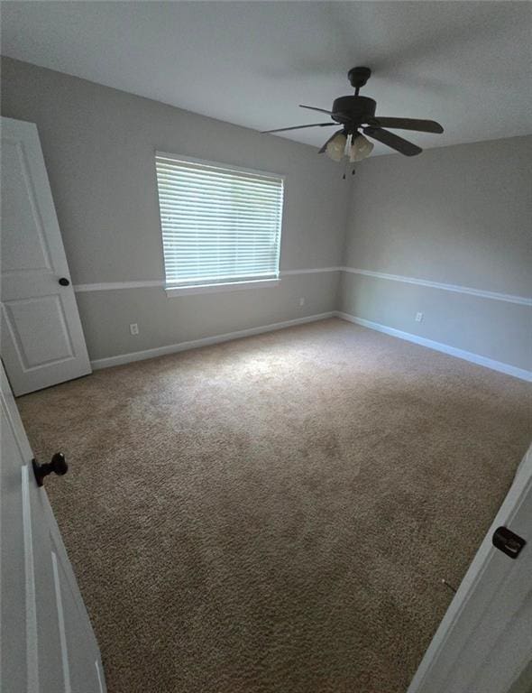 4973 Mccrary Rd, Semmes, AL 36575 - unfurnished room featuring ceiling fan and carpet flooring