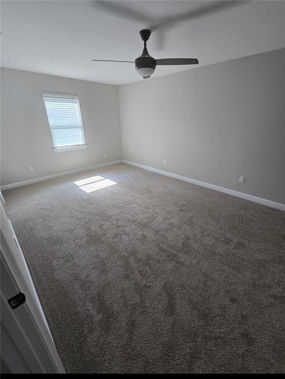 4973 Mccrary Rd, Semmes, AL 36575 - empty room featuring carpet floors and ceiling fan