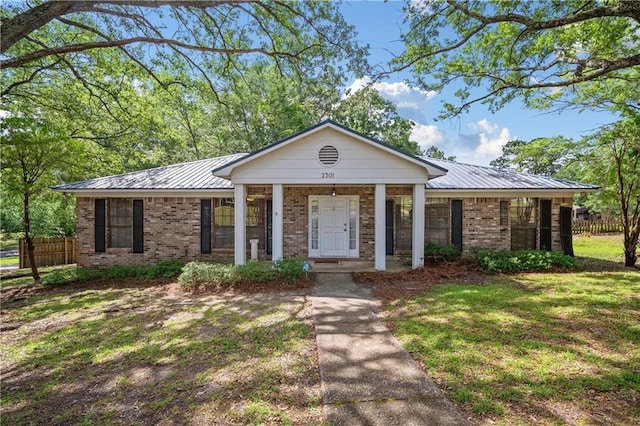 2301 Cedar Ky, Mobile, AL 36695 - ranch-style home with brick siding, covered porch, and a metal roof