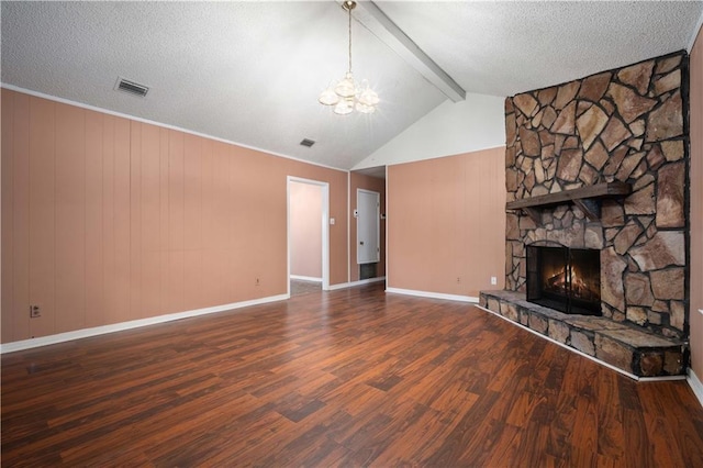 2301 Cedar Ky, Mobile, AL 36695 - unfurnished living room featuring wood finished floors, a chandelier, a stone fireplace, a textured ceiling, and wood walls