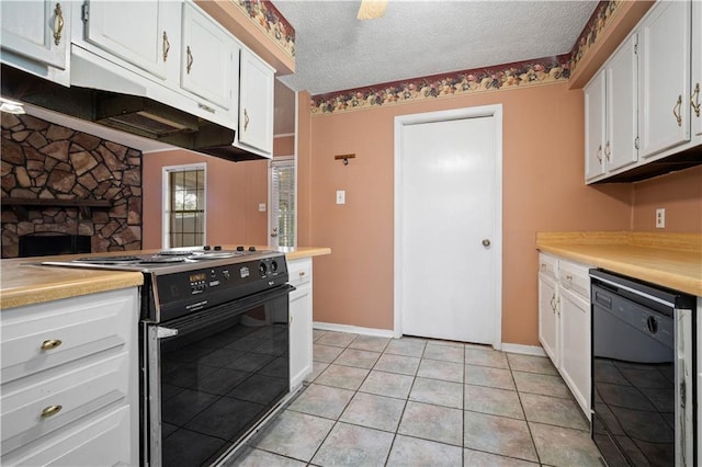 2301 Cedar Ky, Mobile, AL 36695 - kitchen featuring electric range oven, dishwasher, white cabinetry, light countertops, and a textured ceiling