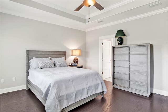 bedroom featuring ceiling fan, crown molding, and dark hardwood / wood-style flooring