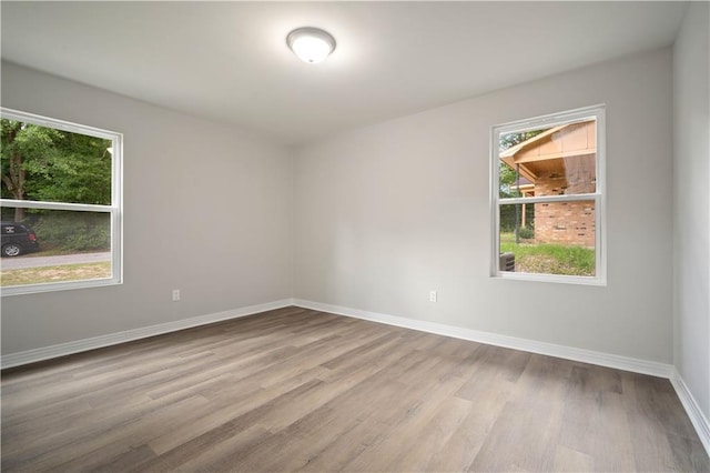 1452 Morlee Dr E, Mobile, AL 36618 - unfurnished room featuring wood finished floors and baseboards