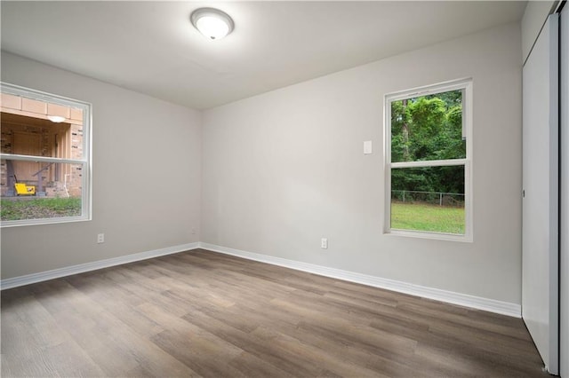 1452 Morlee Dr E, Mobile, AL 36618 - spare room featuring wood finished floors and baseboards