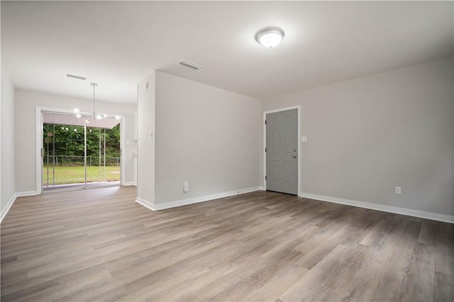 1452 Morlee Dr E, Mobile, AL 36618 - spare room featuring wood finished floors and baseboards