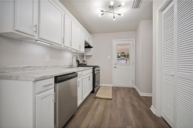 1452 Morlee Dr E, Mobile, AL 36618 - kitchen featuring stainless steel appliances, a sink, dark wood-type flooring, light countertops, and white cabinets