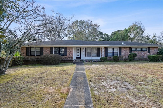 ranch-style house with a front yard