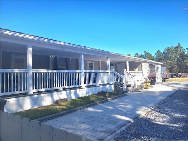 exterior space featuring covered porch