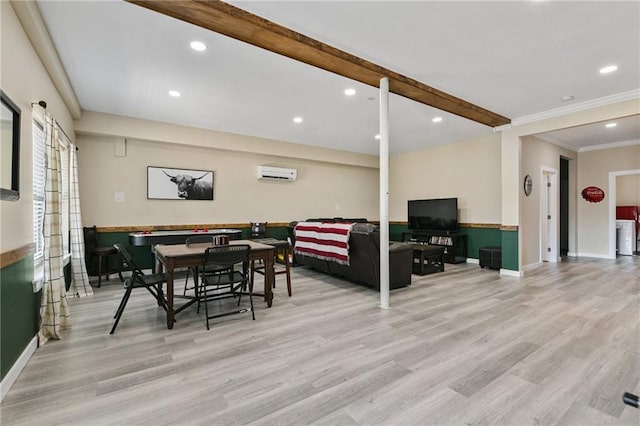 living room with an AC wall unit, light hardwood / wood-style flooring, and beam ceiling