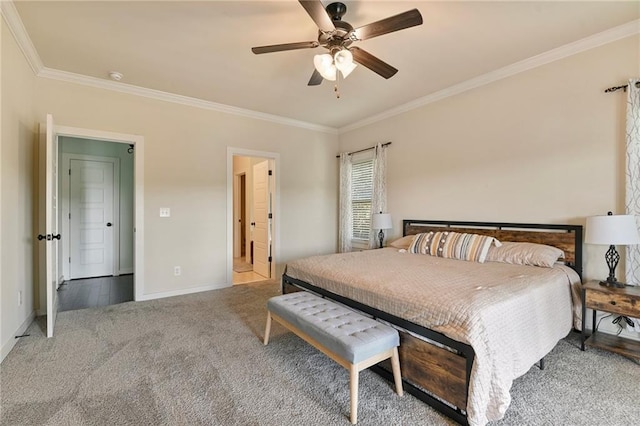 carpeted bedroom with crown molding and ceiling fan