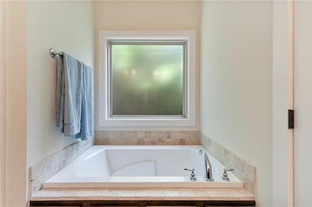 bathroom with a washtub