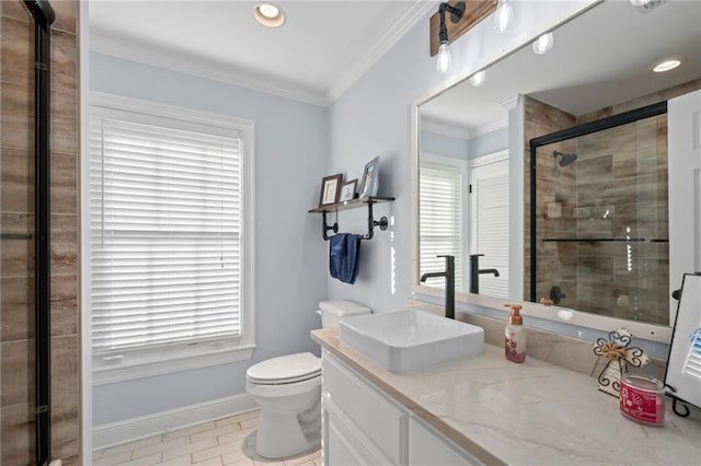 bathroom with vanity, crown molding, tile patterned flooring, toilet, and a shower with shower door