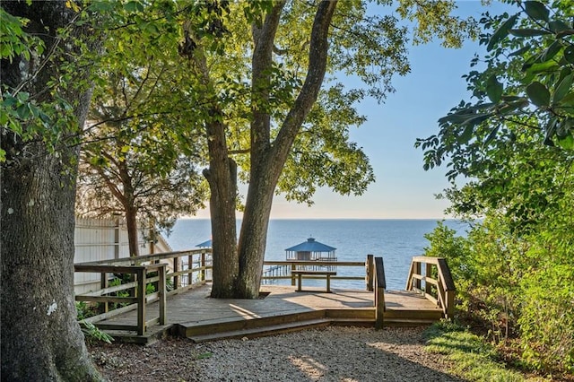 dock area with a deck with water view