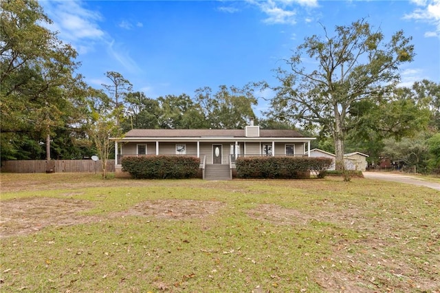 single story home with a front yard