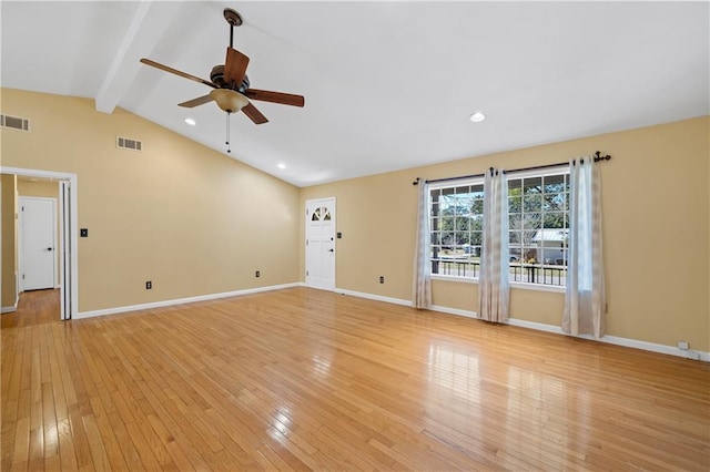 unfurnished living room featuring baseboards, visible vents, vaulted ceiling with beams, and light wood finished floors