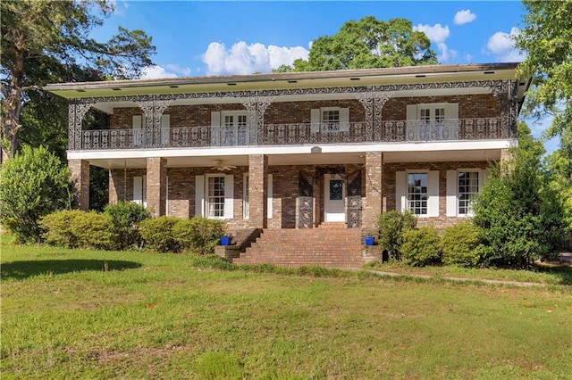 608 Montclaire Way, Mobile, AL 36609 - view of front of house featuring french doors, brick siding, and a front lawn