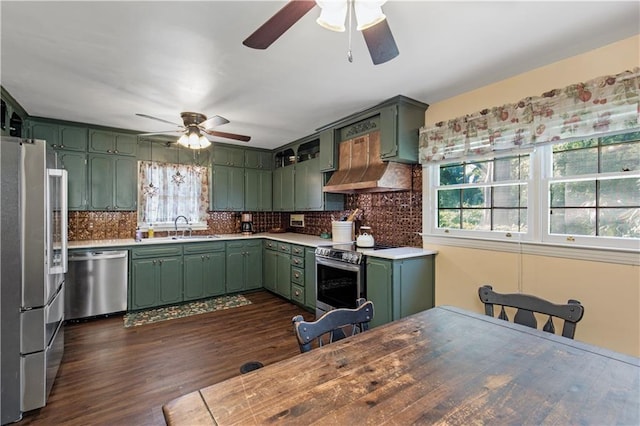 608 Montclaire Way, Mobile, AL 36609 - kitchen with green cabinetry, stainless steel appliances, a ceiling fan, and plenty of natural light