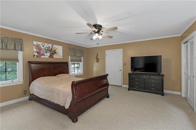 608 Montclaire Way, Mobile, AL 36609 - bedroom featuring baseboards, ornamental molding, a closet, and light colored carpet