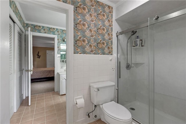 608 Montclaire Way, Mobile, AL 36609 - bathroom with wallpapered walls, a shower stall, ensuite bathroom, tile walls, and crown molding