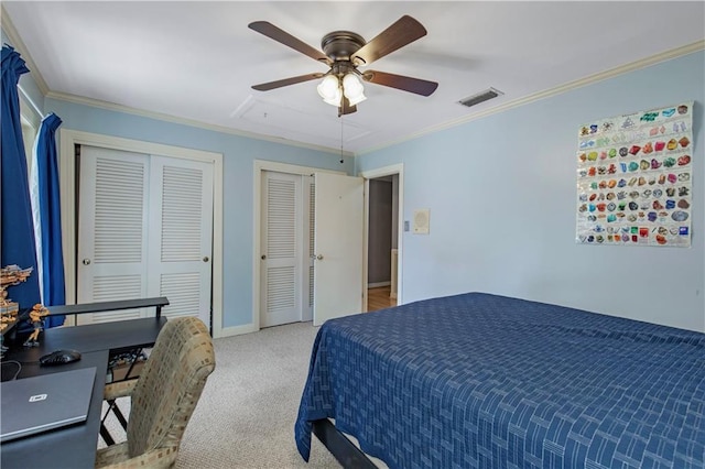608 Montclaire Way, Mobile, AL 36609 - carpeted bedroom featuring multiple closets, ornamental molding, ceiling fan, and baseboards