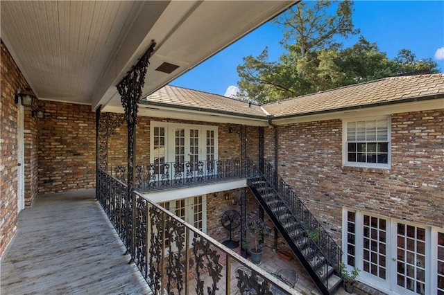 608 Montclaire Way, Mobile, AL 36609 - wooden deck featuring french doors and stairway
