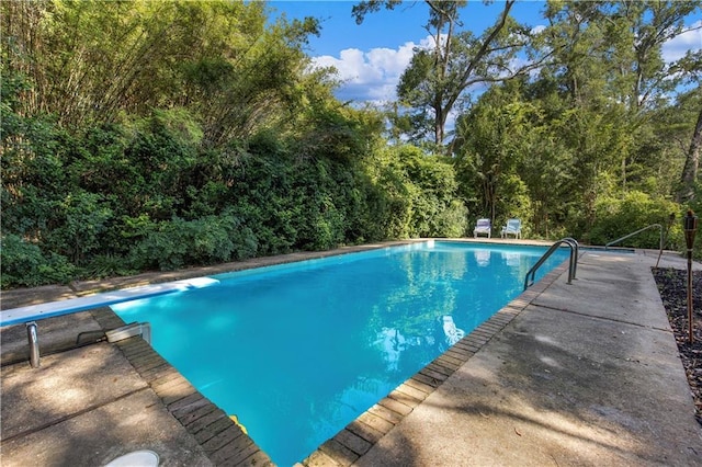 608 Montclaire Way, Mobile, AL 36609 - outdoor pool featuring a diving board
