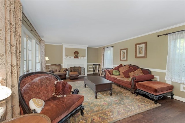 608 Montclaire Way, Mobile, AL 36609 - living room with wood finished floors, plenty of natural light, ornamental molding, baseboards, and a fireplace