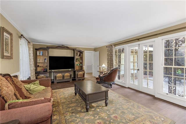 608 Montclaire Way, Mobile, AL 36609 - living room with healthy amount of natural light, crown molding, and wood finished floors