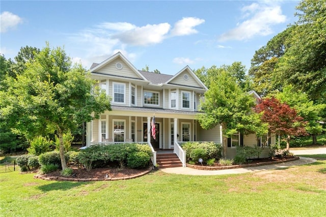 9102 Magnolia Ct, Spanish Fort, AL 36527 - view of front of property featuring covered porch and a front yard