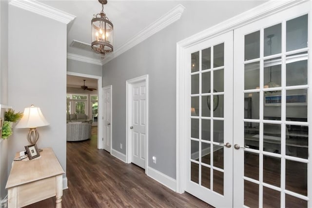 9102 Magnolia Ct, Spanish Fort, AL 36527 - corridor featuring crown molding, a chandelier, french doors, dark wood-style floors, and baseboards